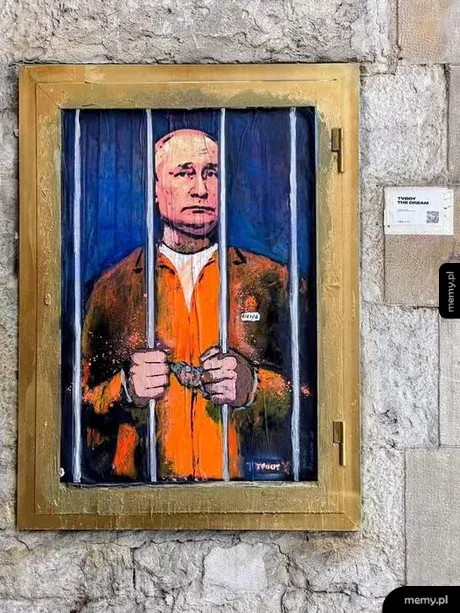 Mural przedstawiający Władimira Putina w pomarańczowym więziennym kombinezonie za kratami.